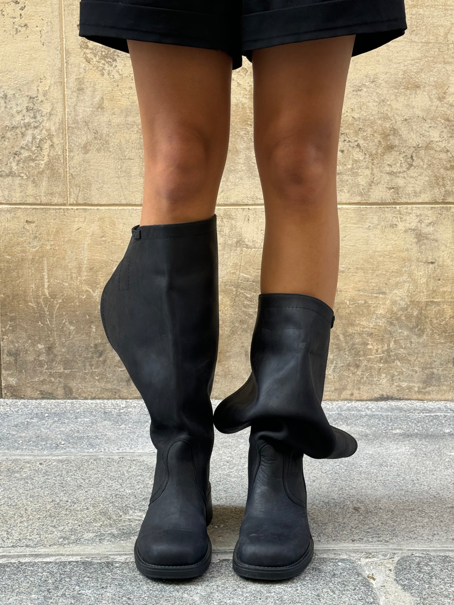 Transformable Black Boots with Open-Back Design