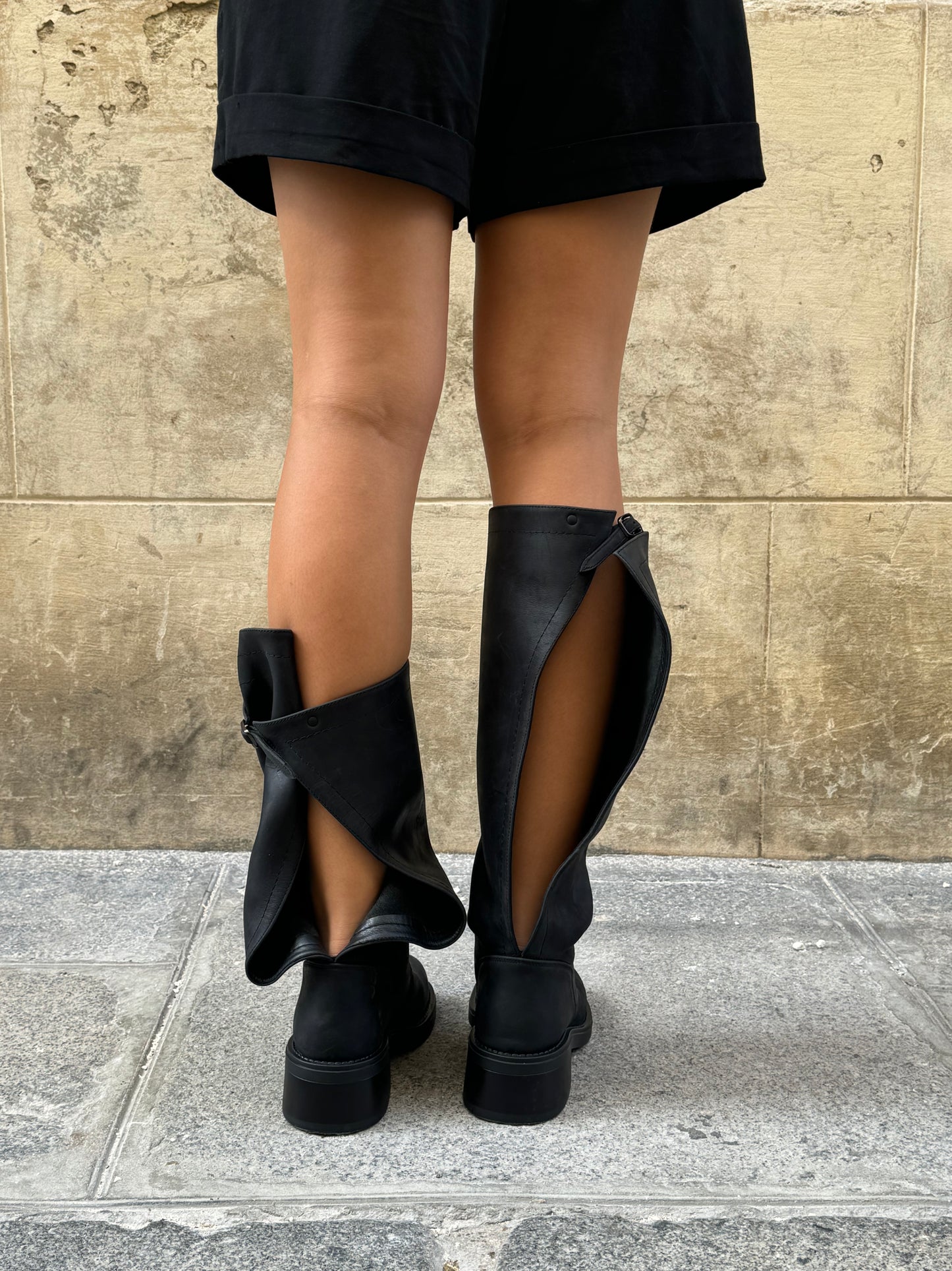 Transformable Black Boots with Open-Back Design