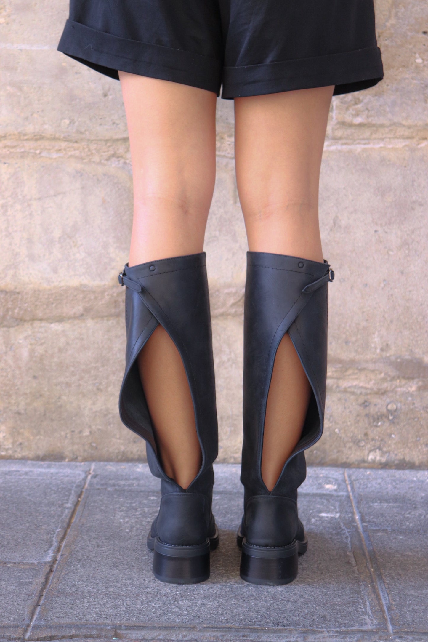 Transformable Black Boots with Open-Back Design